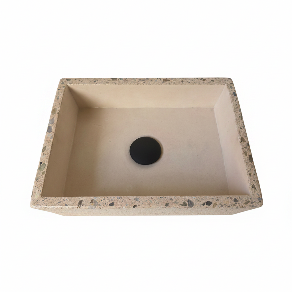 Beige rectangular concrete sink with polished edge design on a white background, top view