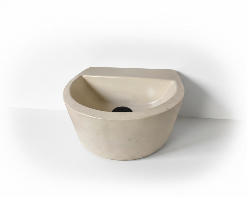 small compact concrete sink, semi oval, in ivory colour