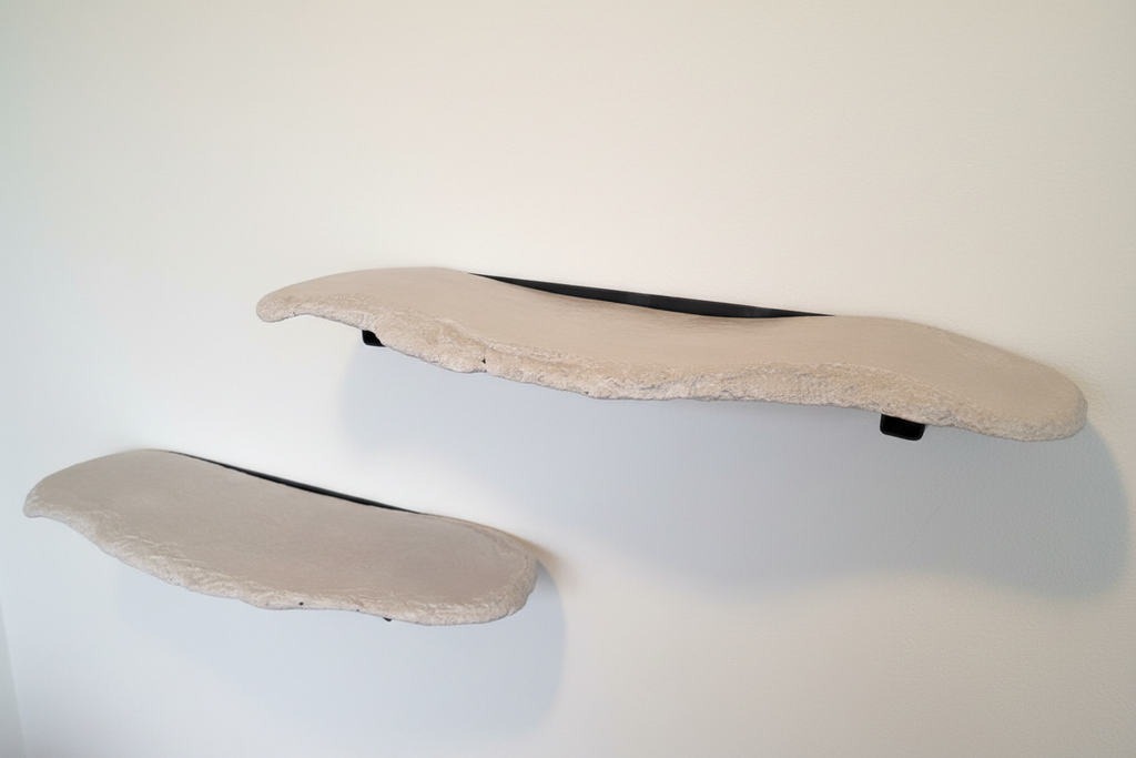 Side view of floating concrete wall shelf with minimalist mounting system