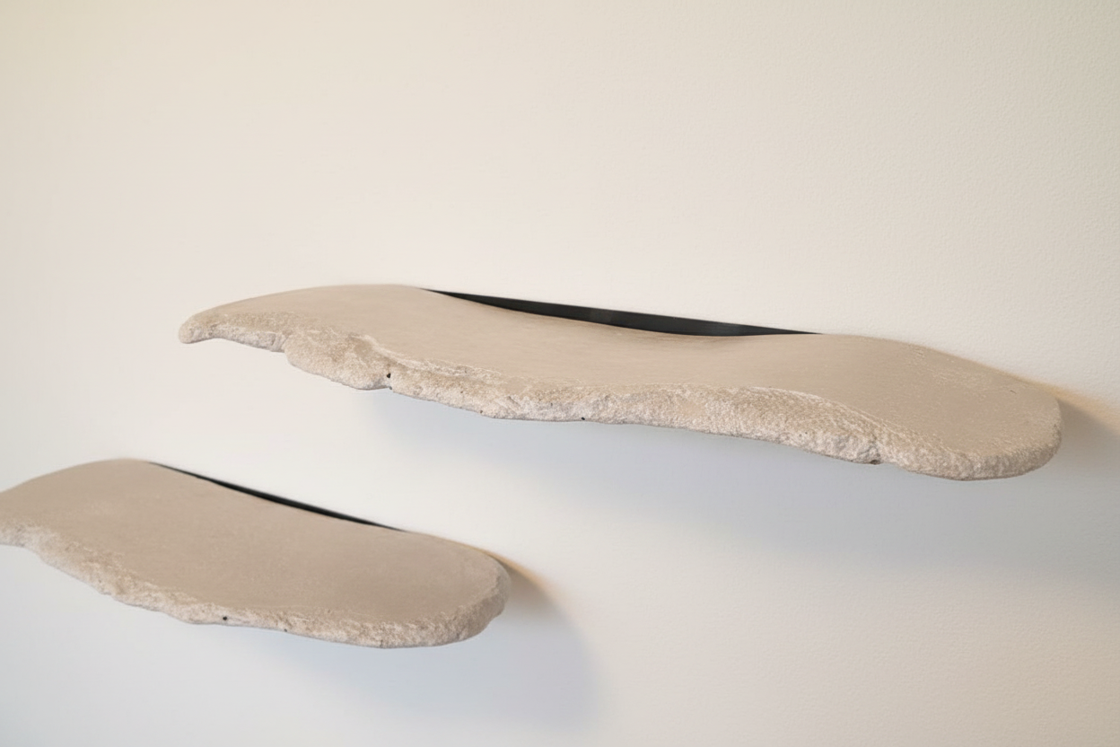 Close-up of concrete shelf surface showing natural texture and finish