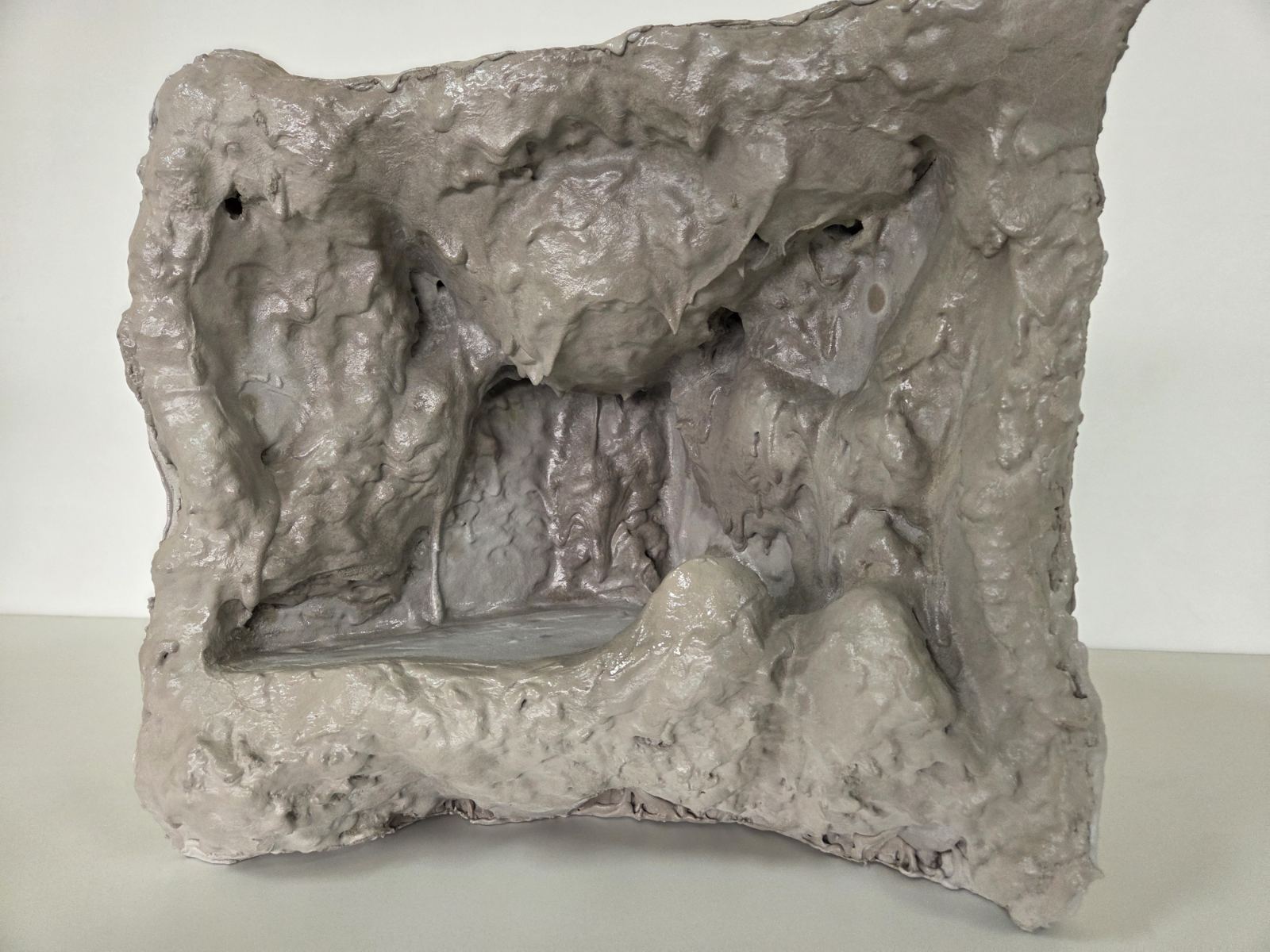 Thea Corner Side Table - Handcrafted Concrete with Sculptural, Cave-Inspired Design