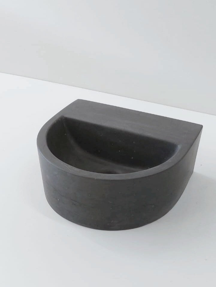 Black ONIK concrete basin for surface or wall mounting