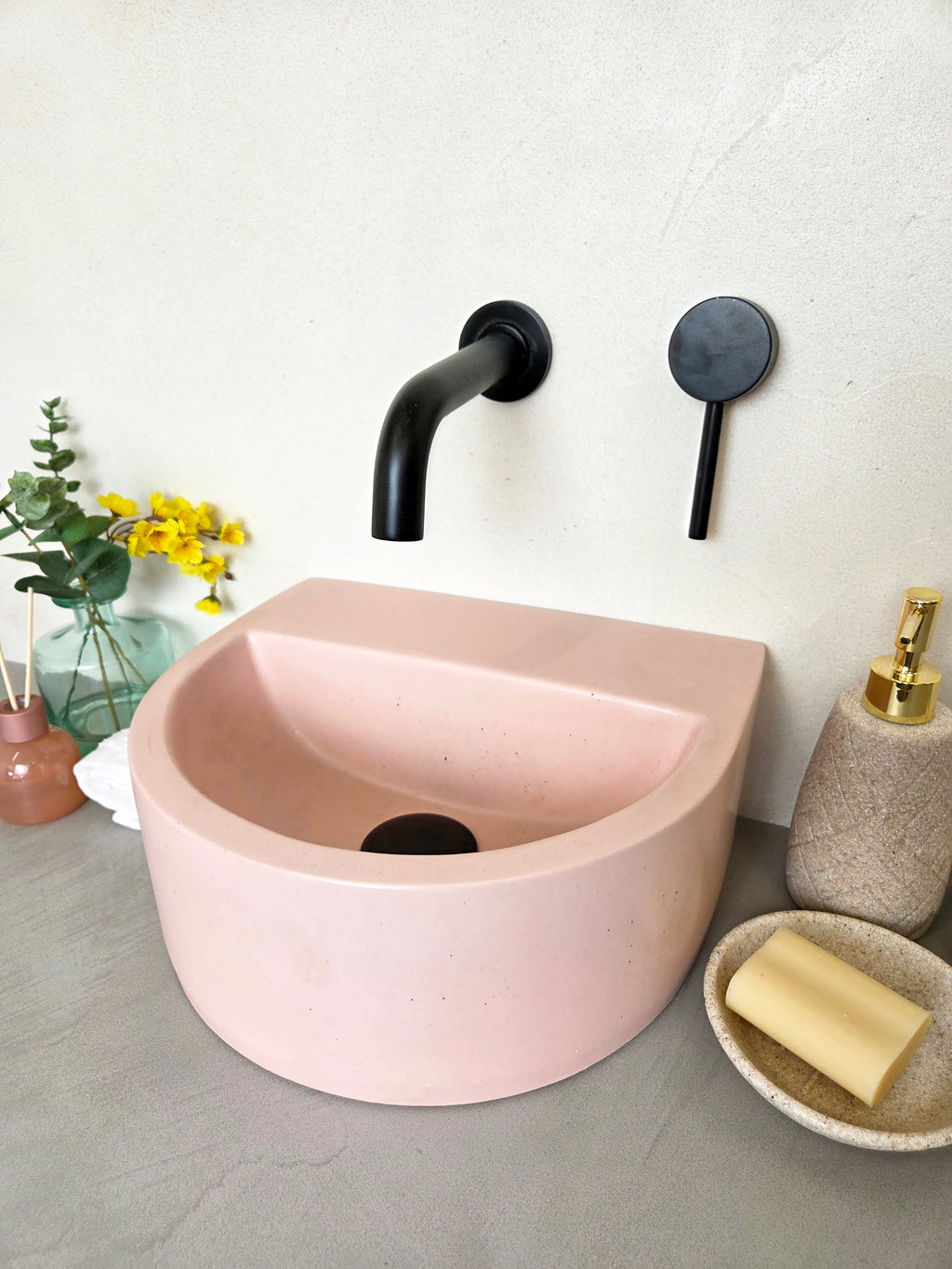 Stylish concrete basin designed for cloakrooms with wall-mounted installation and rear ledge