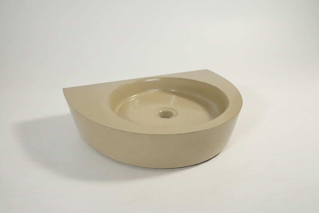 Side profile of curved concrete vanity sink