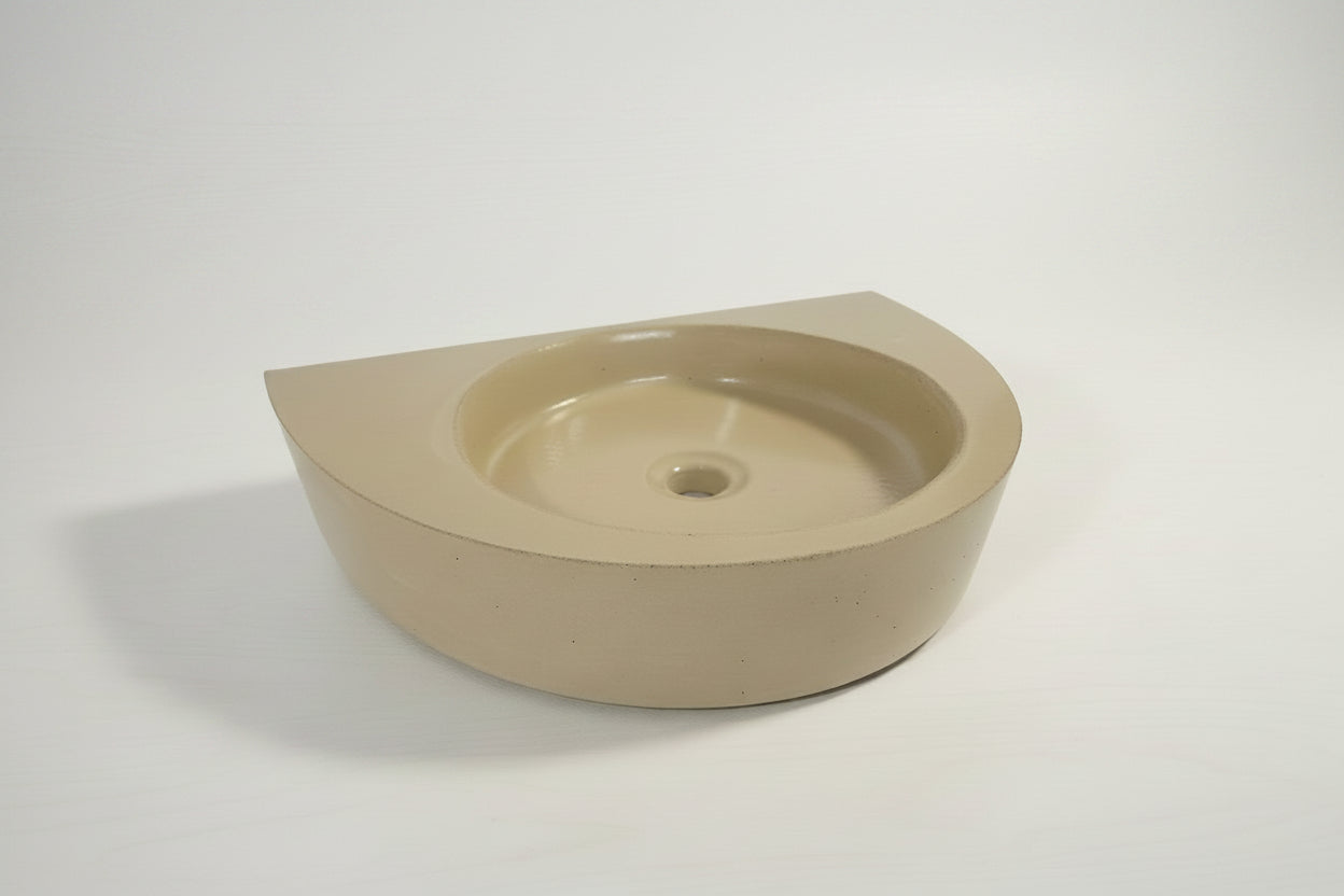 Side profile of curved concrete vanity sink