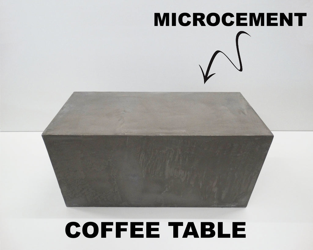 Front view of a grey rectangular microcement coffee table with a solid block design and clean minimalist lines.