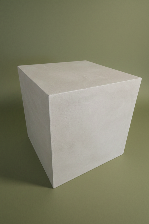Minimalist cube side table in off-white microcement finish