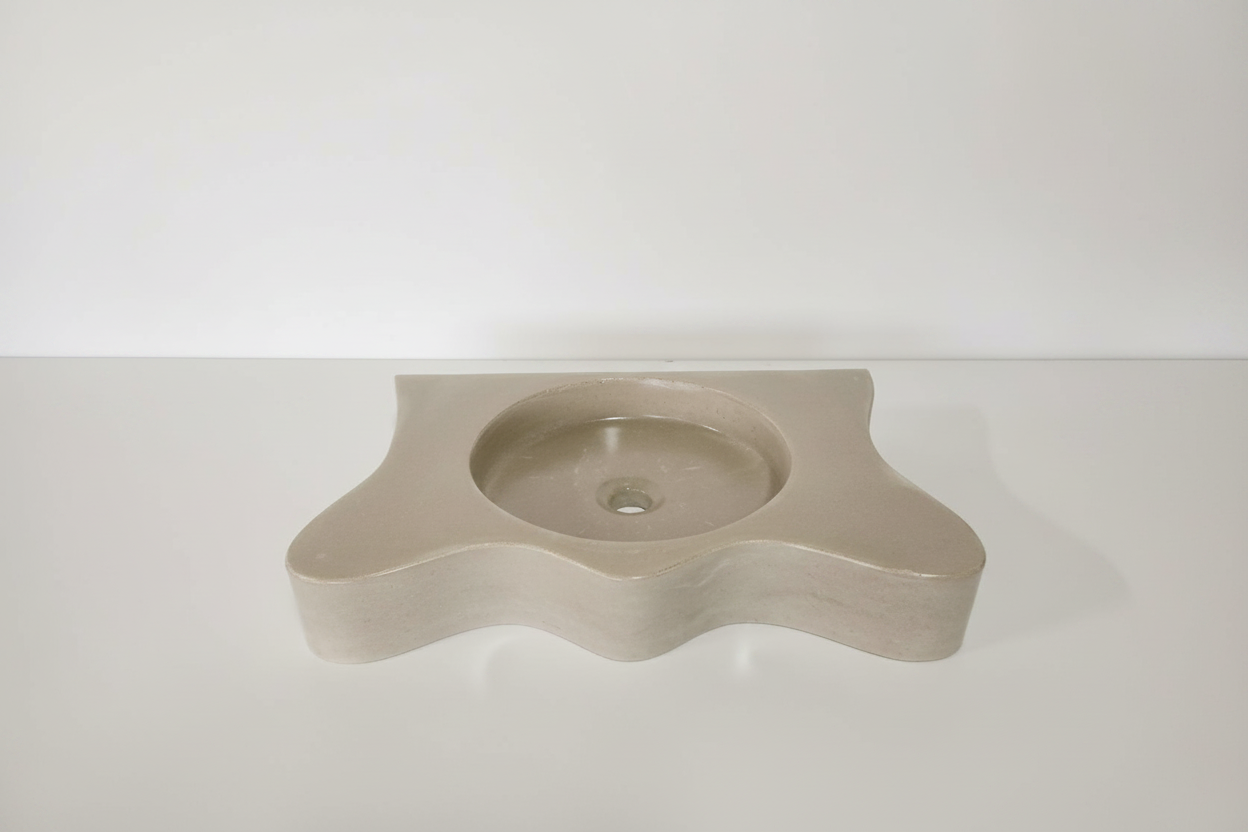 front view of plana wave concrete vanity showcasing the unique silhouette and shape by nedevdesign