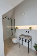 grey concrete sink mounted on bespoke steel frame