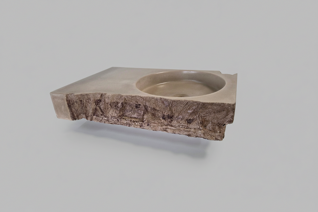 Sculptural concrete sink with raw finish